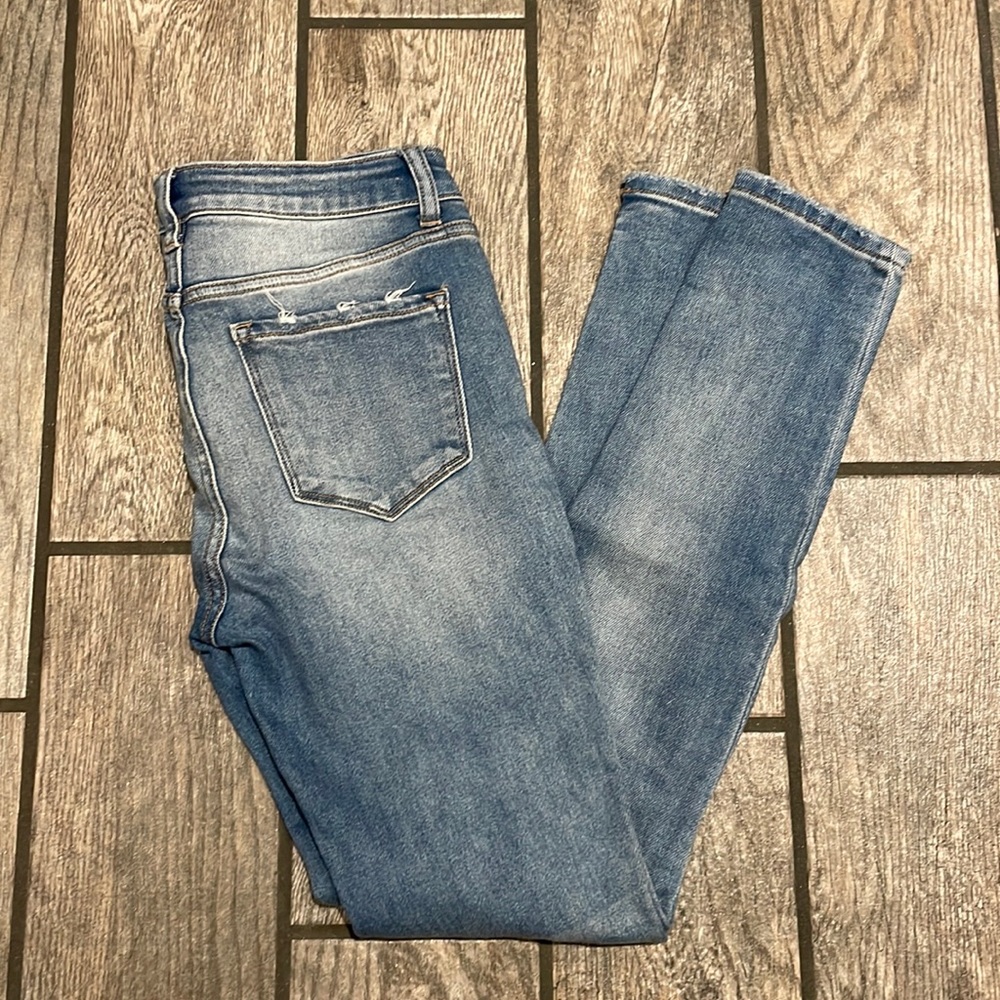 Bridge by Gly, size 29, light wash distressed, mid rise skinny Jean.